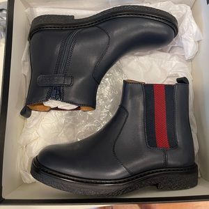 Unisex authentic Gucci boots with zipper. Size 28 Brand new in box.